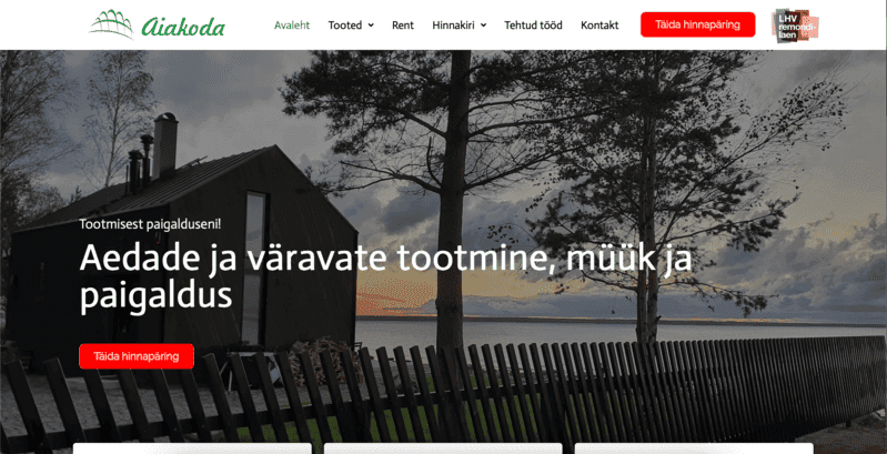 Aiakoda.ee kodulehe avavaade - vertikaalne lippaed modernset maja ümbritsemas